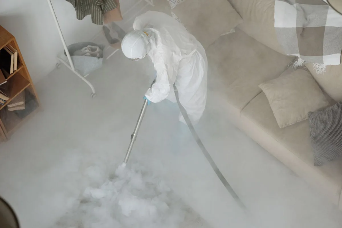 Biohazard cleanup technician in protective equipment, Mayo, SC